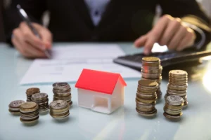 Schéma explicatif du calcul du taux d’endettement pour obtenir un prêt locatif